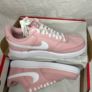 Pink and white Nikes